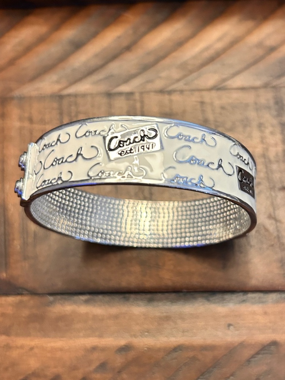 Coach Silver-Tone Signature Script Hinged Bangle - Picture 7 of 7